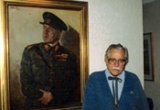 Schneidarek, jr. with the portrait of his father